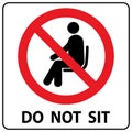 Do Not Sit Here Signage for restaurants and public places inorder to encourage people to practice social distancing to further Royalty Free Stock Photo