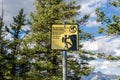 Do not throw rocks climbers below warning sign signpost at Tunnel Mountain Trail. Banff National Park Royalty Free Stock Photo