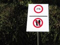 Do not walk here, no cycling. Prohibition sign