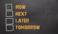 Do it now - business concept on blackboard Royalty Free Stock Photo