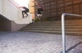 Do one thing every day that scares you. two young men skating in the city.