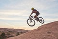 Do one thing that scares you every day. a young man out mountain biking during the day. Royalty Free Stock Photo