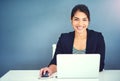 Do it with passion or not at all. a young businesswoman working at her desk. Royalty Free Stock Photo