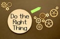 do the right thing. text on torn paper on white backing Royalty Free Stock Photo