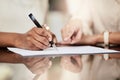 Do these terms meet your needs. a businesswoman signing a contract.