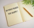 Do what makes you happy symbol. Notebook with words Do what makes you happy. Business, do what makes you happy concept Royalty Free Stock Photo