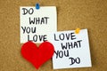 Do what you love, love what you do - motivational word advice or reminder on sticky notes on cork board background Royalty Free Stock Photo