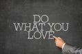 Do what you love text on blackboard Royalty Free Stock Photo