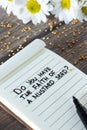 Do you have faith of mustard seed, inspiring Christian text handwritten in notebook with flowers on wooden table