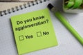 Do you know agglomeration write on sticky notes isolated on Wooden Table. A person is answering question concept Royalty Free Stock Photo