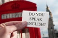 do you speak english? in a signboard with the Big Ben in the background Royalty Free Stock Photo