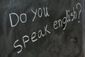 Do you speak English, written on a blackboard Royalty Free Stock Photo