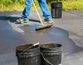 Maintaining an asphalt driveway with blacktop sealer