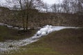 Dobele Castle ruins in winter with snowman sportist figures