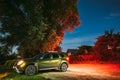 Dobrush, Belarus. Renault Duster Suv Car Parking On Street Under Night Starry Sky Above Renault Duster Suv. Duster