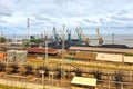 Dock cranes in a small sea port