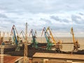 Dock cranes in a small sea port