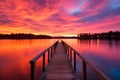 a dock extends into the water at sunset