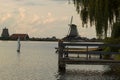 Dock in front of windmill background