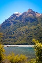 Lake with dock and mountain in the background Royalty Free Stock Photo