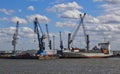 Dock and harbor cranes in Hamburg harbor in Germany