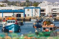 Dock, harbour, pier, with boats in water and land, Lagos, Portugal Royalty Free Stock Photo