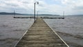 Dock jutting out over lake Royalty Free Stock Photo