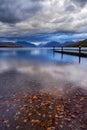 The dock on Lake MacDonald in Glacier National Park. Royalty Free Stock Photo