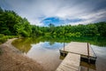 Dock in Lake Marburg, at Codorus State Park, Pennsylvania. Royalty Free Stock Photo