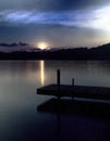 Dock on lake at sunset Royalty Free Stock Photo