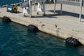 Dock with large buoys with tires