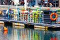 Dock with lifebuoys in the port