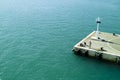 Dock and lighthouse Royalty Free Stock Photo