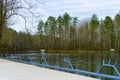 Dock at water`s ed along the South Holston River in Tennessee