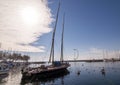 A docked boat and The Eole wind vane  Lausanne  Switzerland Royalty Free Stock Photo