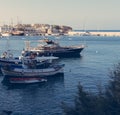 Docked boats in the harbour of Agios Nikolaos, Crete Greece