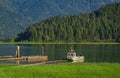 Docked fishing boat in early morning. Motor boats at the pier in the sea at moody weather in Canada at Pitt Lake BC Royalty Free Stock Photo