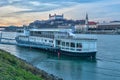 Docked ship at Danube river bank and Bratislava castle Royalty Free Stock Photo