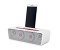 Docking station speaker and smartphone Royalty Free Stock Photo