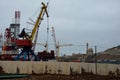 Docks in Baku with Bibiheybat Mosque in background