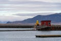 the docks in Reykjavik city Iceland with mountains on the background