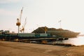 Docks in spain with a massive ship under construction under the sunset Royalty Free Stock Photo