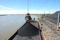 Dockside cargo crane at river port Kolyma Royalty Free Stock Photo