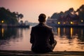 Dockside reflection man in suit contemplates by the waters edge