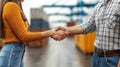 Dockworkers handshake, port logistics deal, containers background Royalty Free Stock Photo