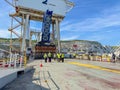 Dockworkers near ferry loading platform with mechanical structure in Dover port Royalty Free Stock Photo