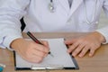 Hand of doctor holdind a pen Royalty Free Stock Photo