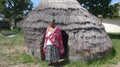 Doctor of African Medicine, in front of her small hut. Royalty Free Stock Photo