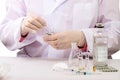 Doctor with ampoules meldonium Royalty Free Stock Photo