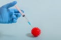 Doctor applying vaccine into virus Royalty Free Stock Photo